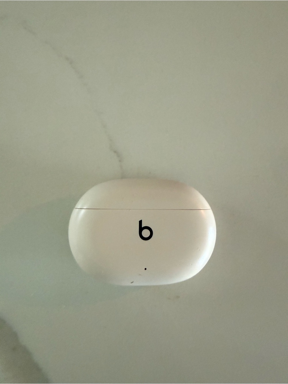 Beats white wireless earbuds